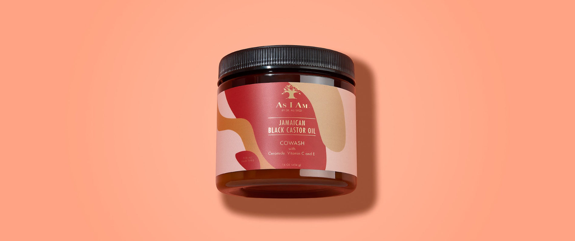 As I Am Jamaican Black Castor Oil CoWash - landschapsopname van de reinigende conditioner die is ontworpen om op milde wijze opbouw te verwijderen en tegelijkertijd de krullen te hydrateren en versterken met JBCO.