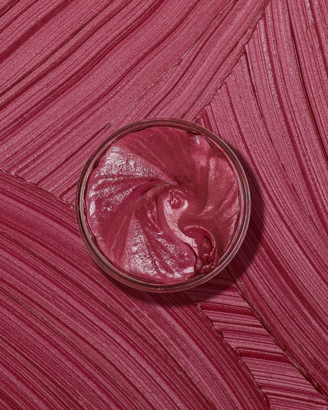 Curl Color in Burgundy van As I Am, een tijdelijke haarkleur met een rijke, glinsterende finish, ontworpen om krullen en spiralen te versterken met een levendige textuur.