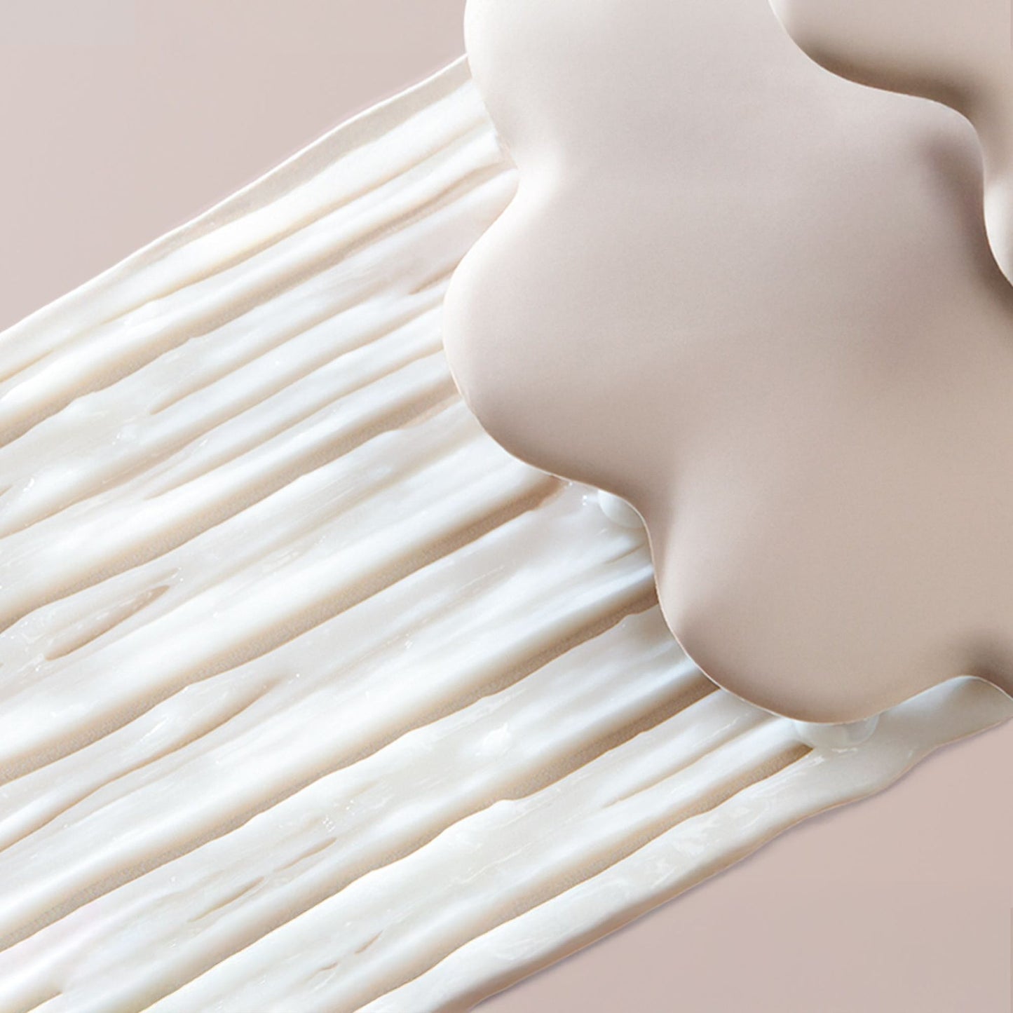 Close-up van een glad, beige gekleurd oppervlak met een soft focus effect.