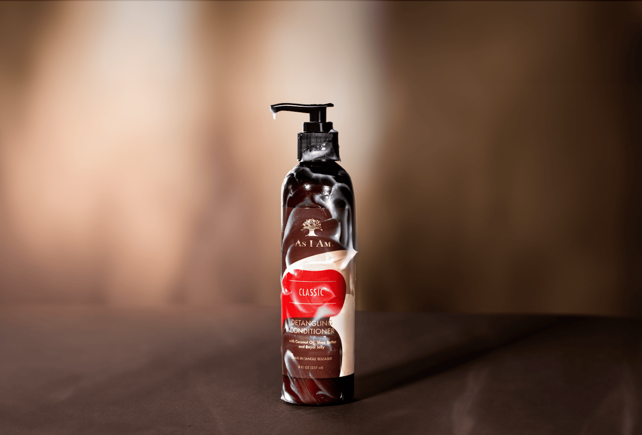 As I Am Detangling Conditioner - een rijke, crèmige formule om knopen glad te maken, het kammen te vergemakkelijken en getextureerd haar te hydrateren.