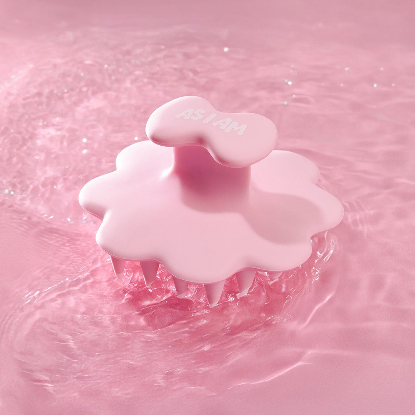 Roze hoofdhuid penseel op een roze water achtergrond