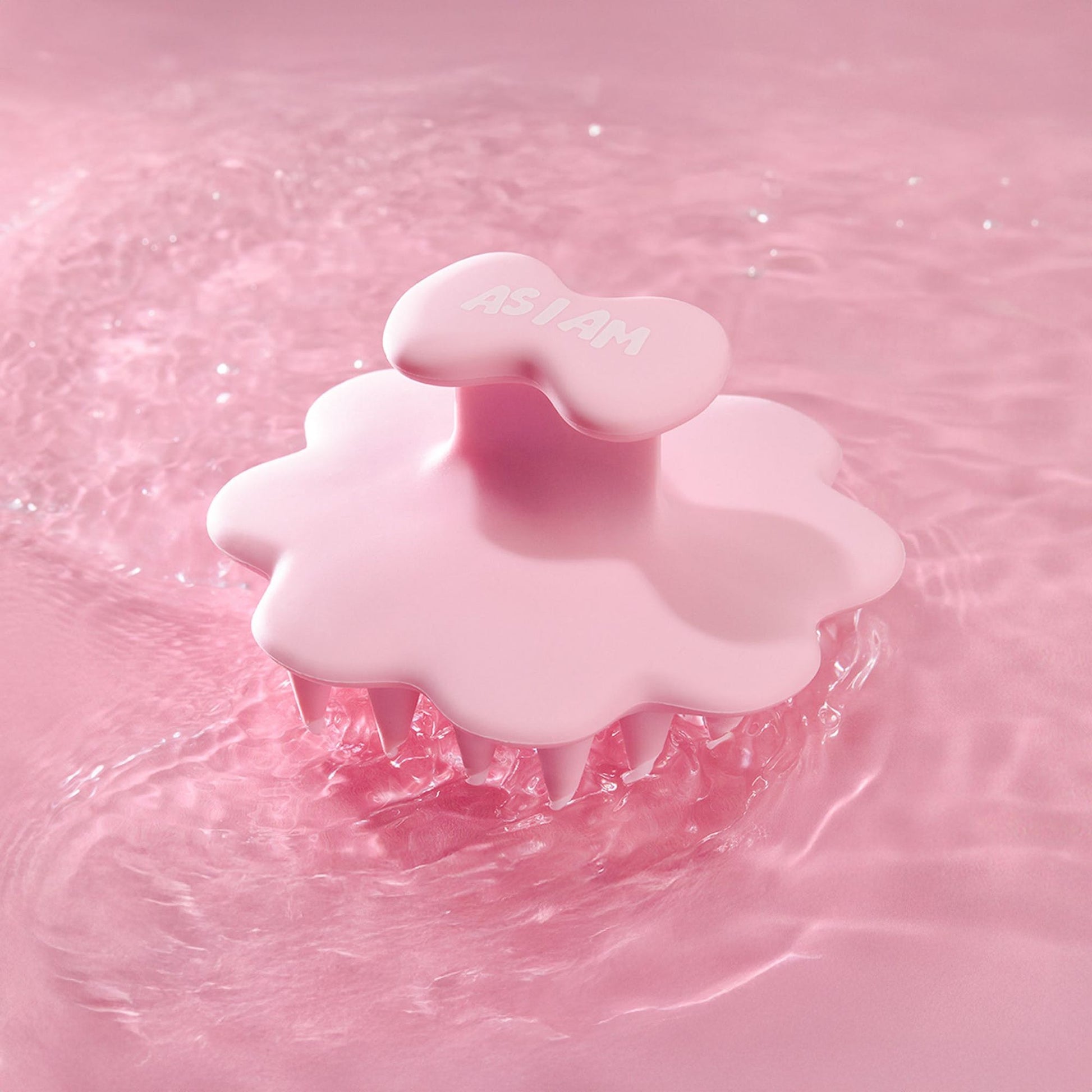 Roze hoofdhuid penseel op een roze water achtergrond