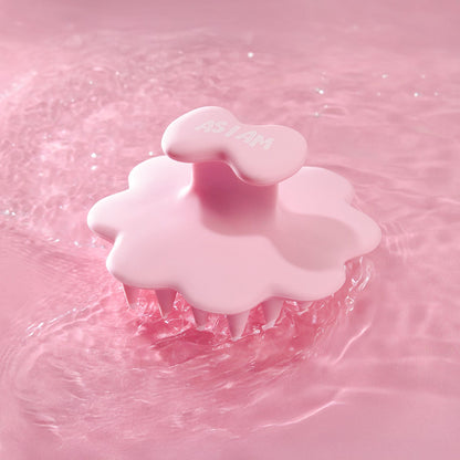 Roze hoofdhuid penseel op een roze water achtergrond
